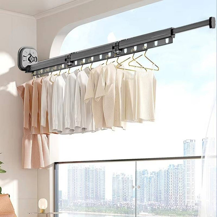 Clothes Drying Rack With 360° Rotating Bars And 25cm Telescopic Extension For Indoor Wall Mounting - Image 1