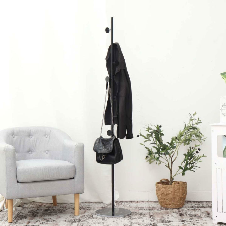 Clothing Rack with Streamlined Freestanding Design and Circular Hooks - Image 1