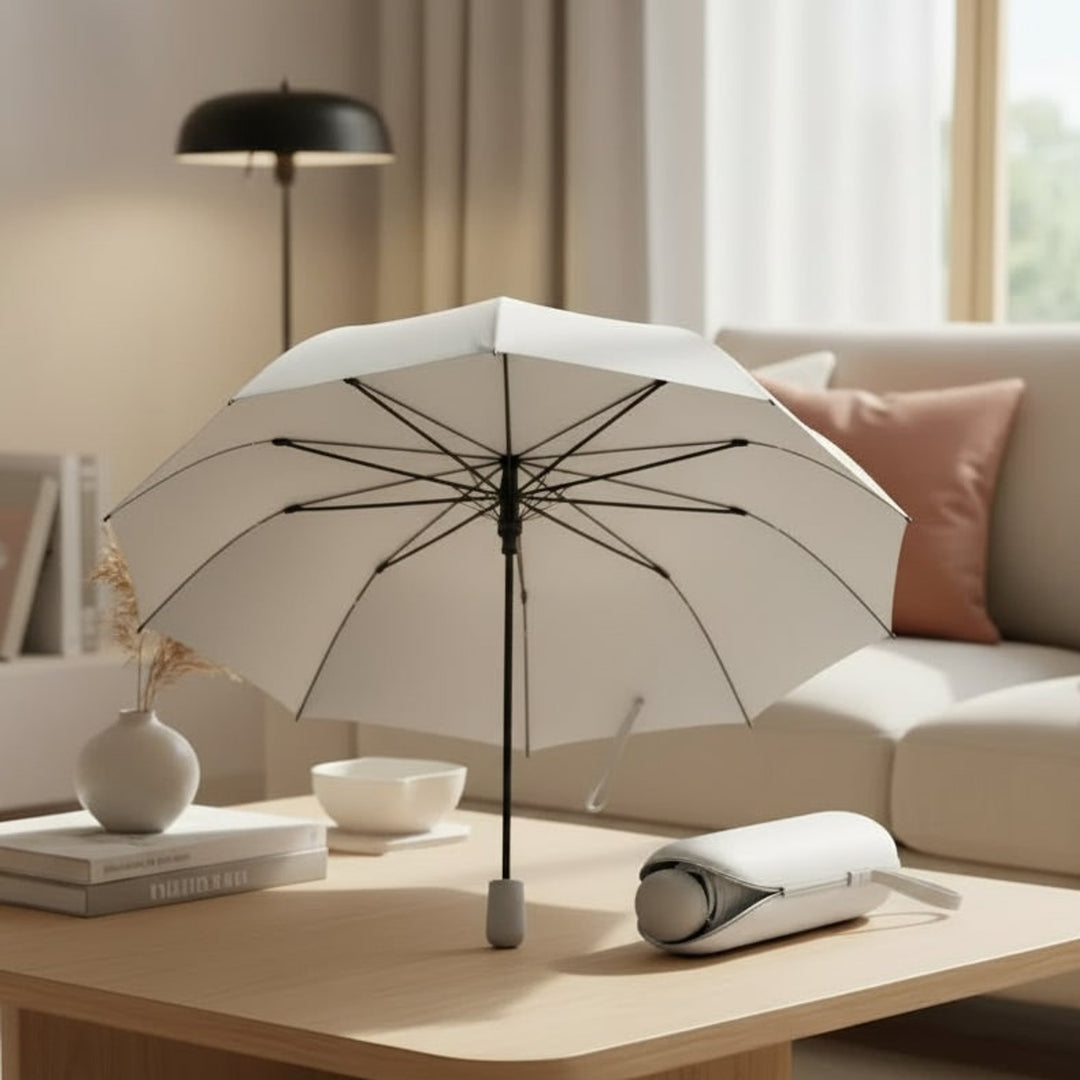 Compact Umbrella with Streamlined Foldable Design and Carry Strap - Image 1