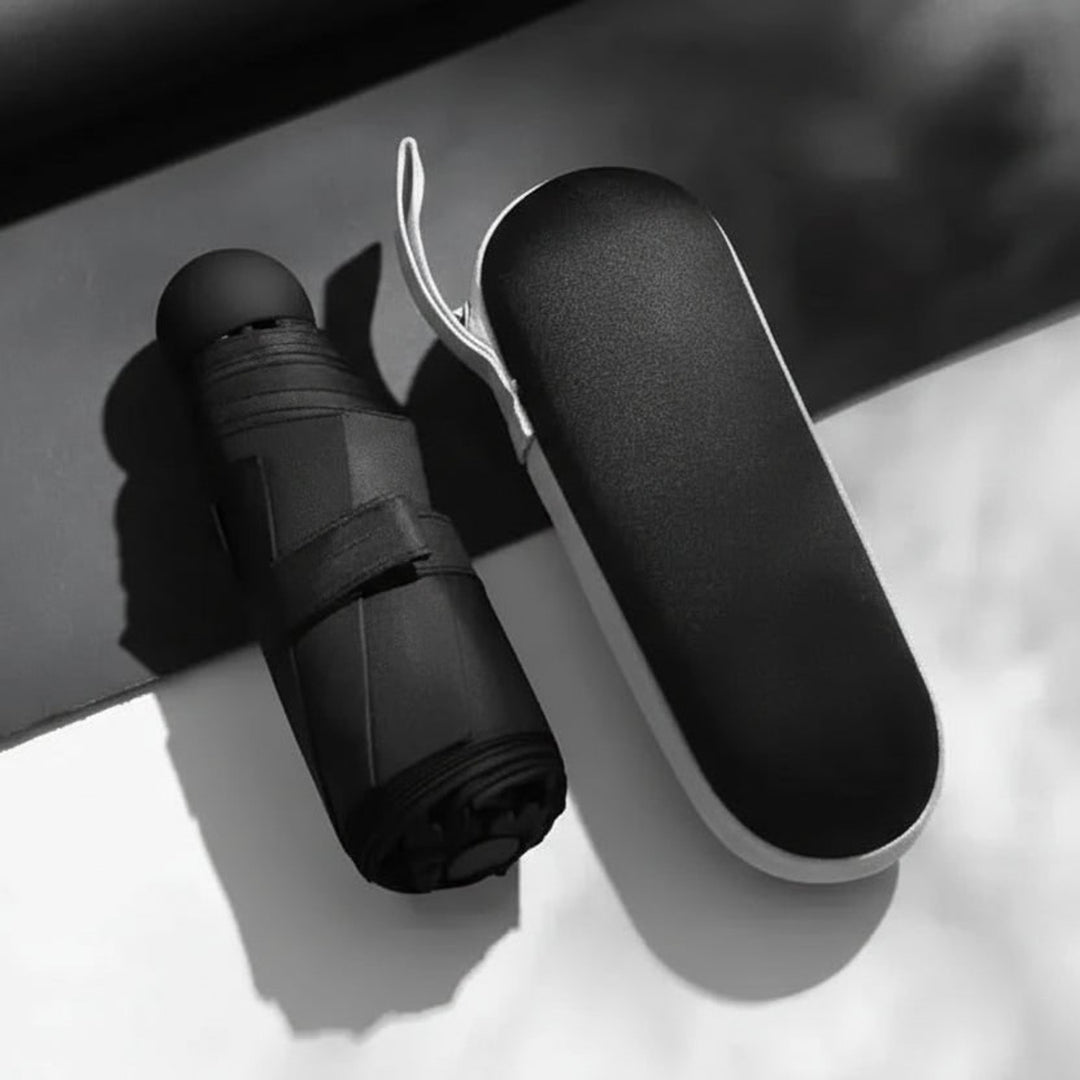 Compact Umbrella with Streamlined Foldable Design and Carry Strap - Image 9