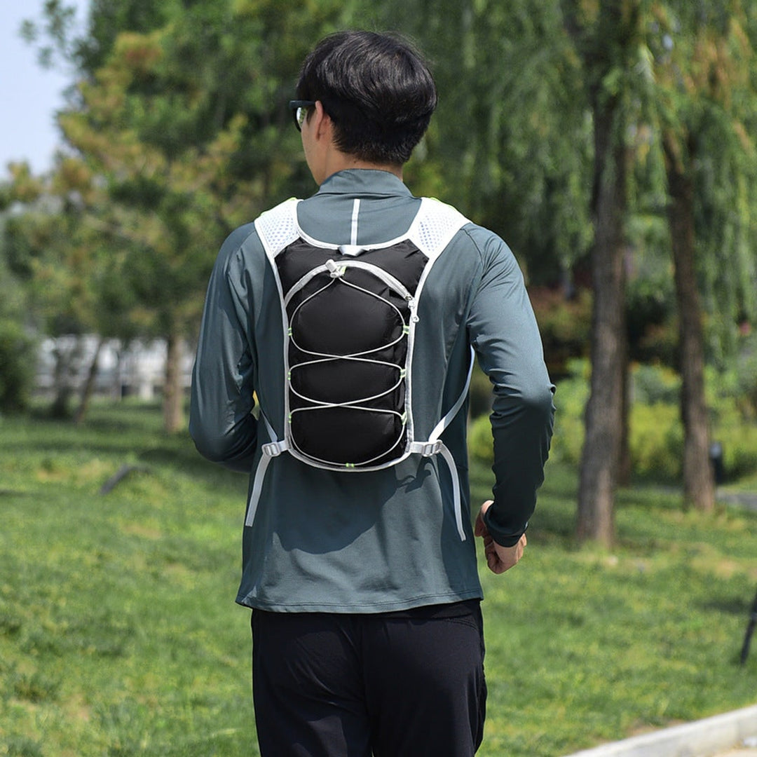 Hydration Vest With Mesh Straps And Detachable Bladder Compartment For Running And Outdoor Activities - Image 1
