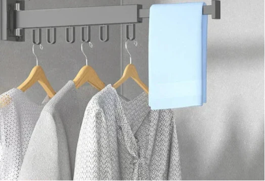 Wall Mounted Drying Rack With Retractable 3-Fold Bar And High Load Capacity Folds Compactly Against Wall For Space-Saving Storage - Image 1
